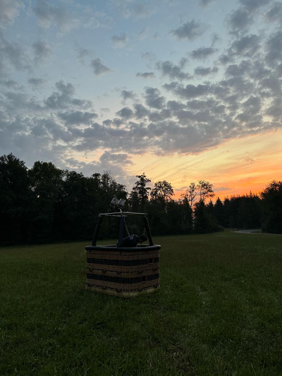 Hot-air balloon basket at sunset
